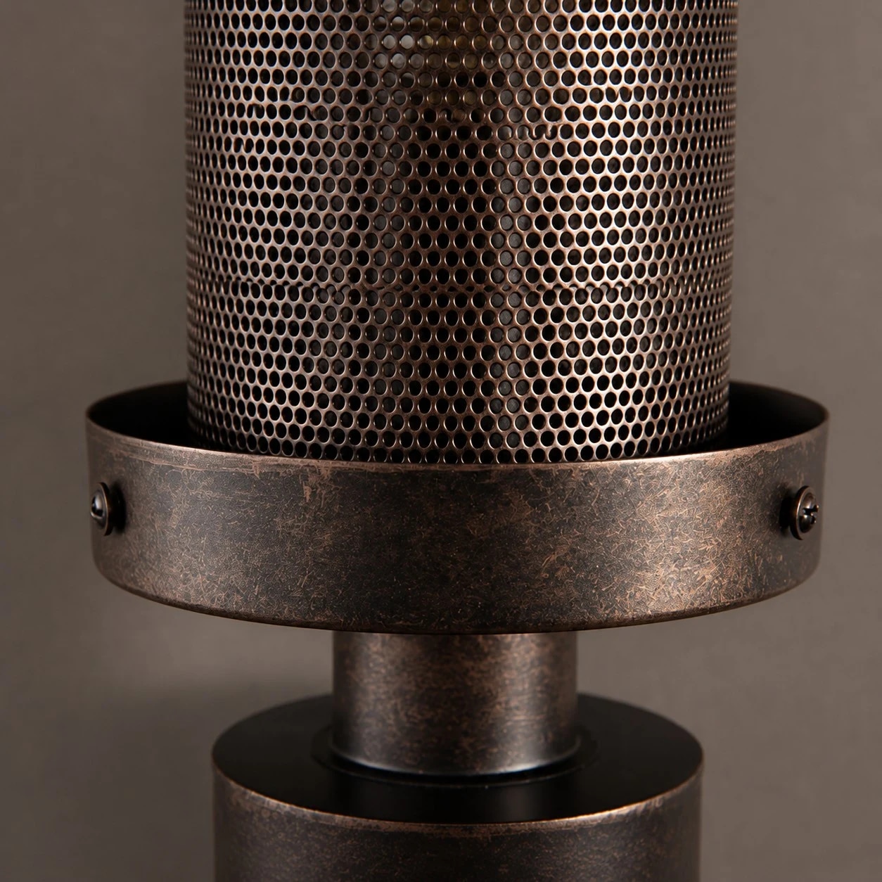 Perforated metal cage and round support ring detail