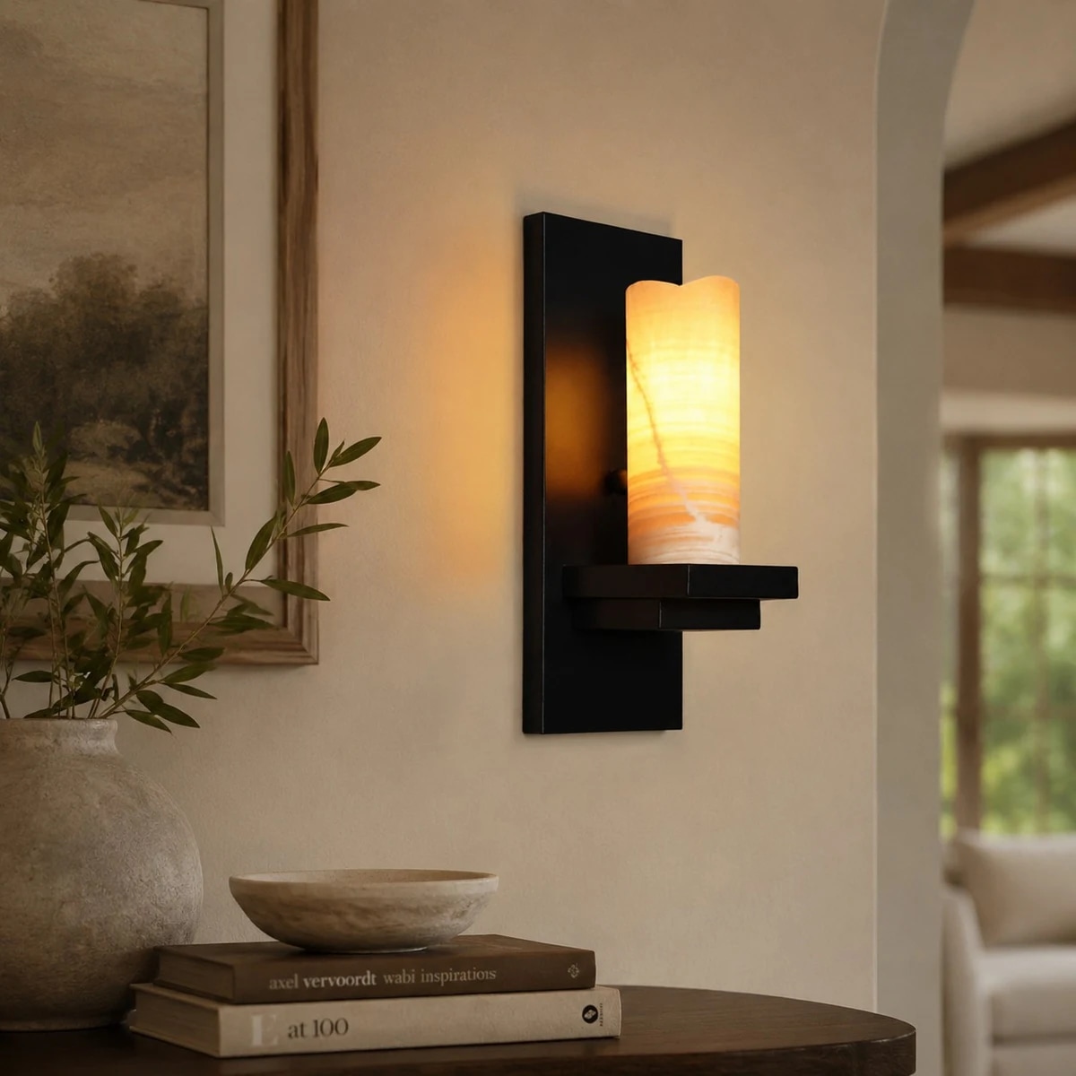 Rustic wall sconce styled above a console
