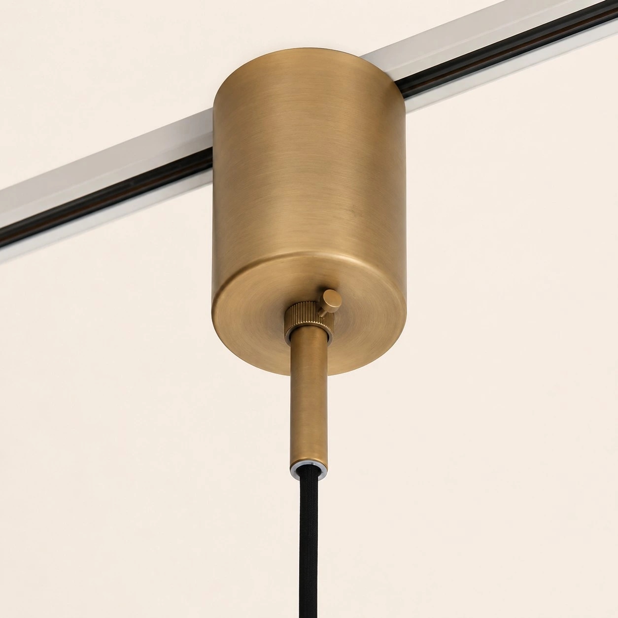 Pendant light close-up showing clear shade and visible bulb form