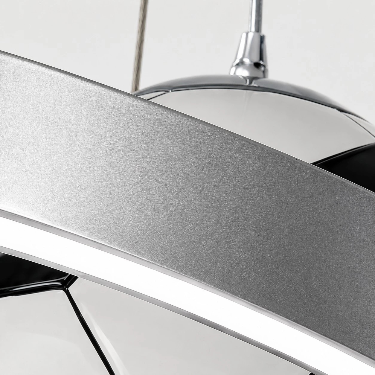 Silver ring and soccer ball shade detail