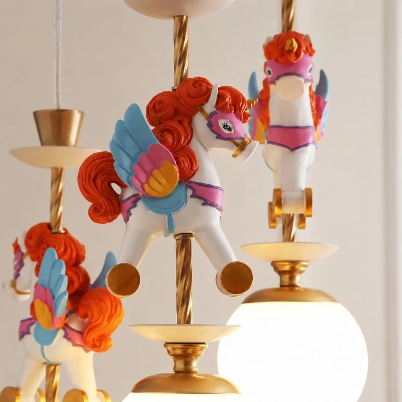 Painted horse ornament and brass fixture detail