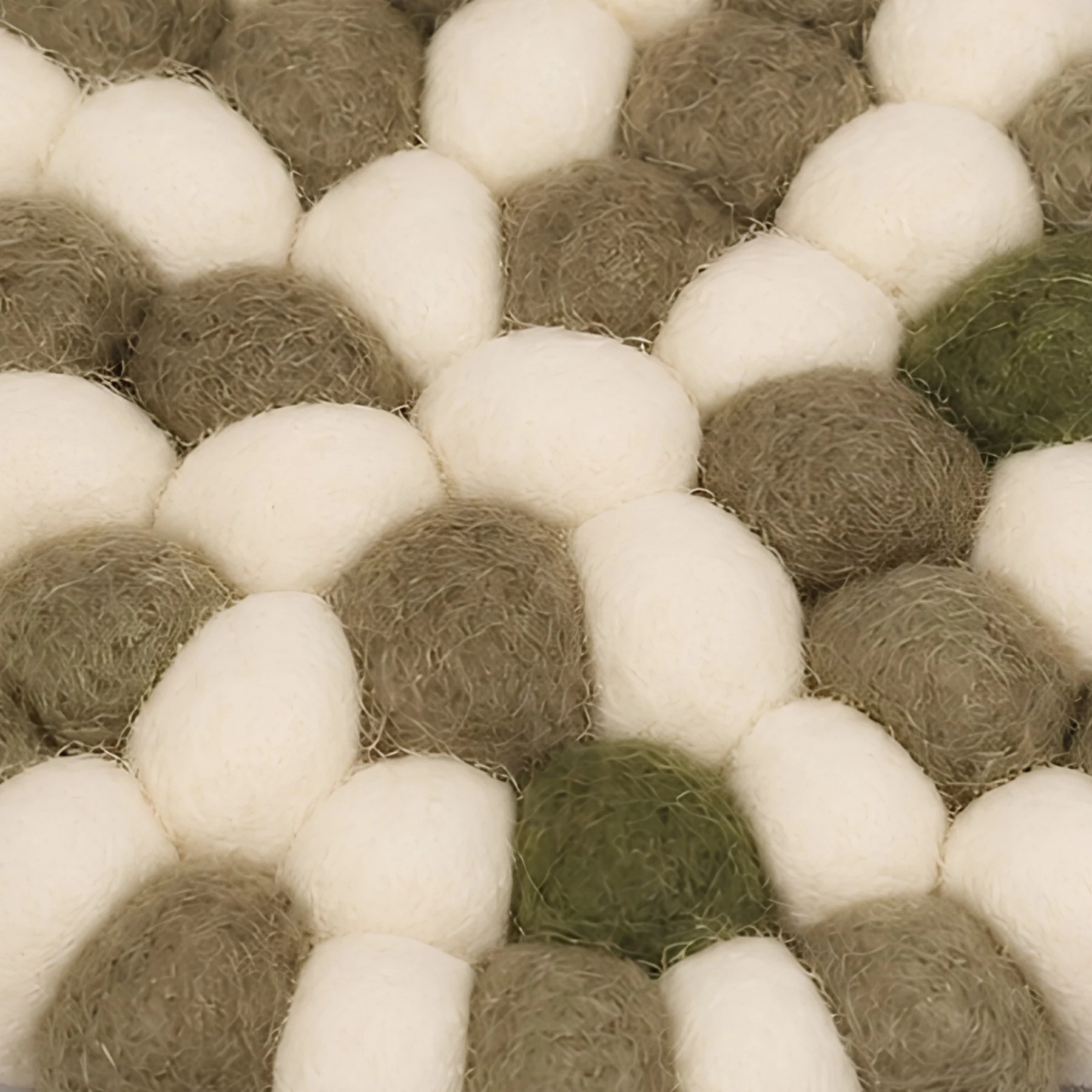 Close view of soft felt ball texture